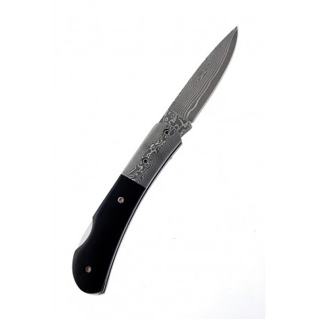 1T. Black knife with blade decorated with acid and textile cover