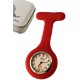 1T. Reloj de colgar en silicona rojo con imperdible «Nurse». En estuche metálico.